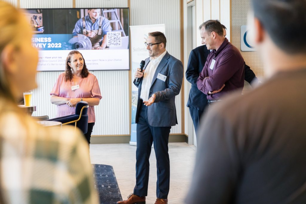 Joel Scully speaking to a business audience